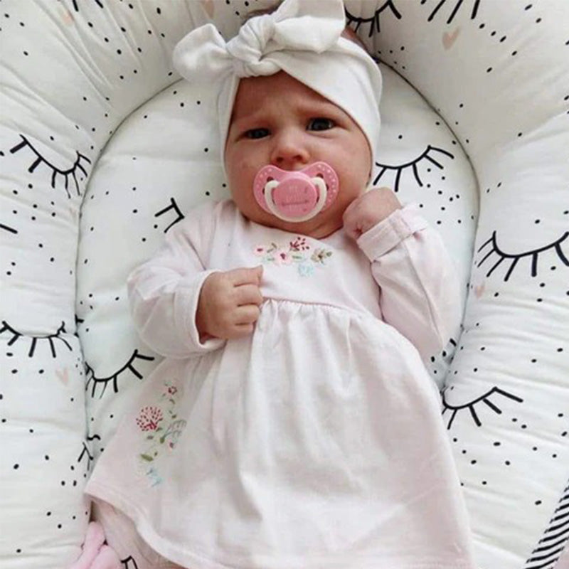 Réducteur de lit bébé – Sommeil paisible