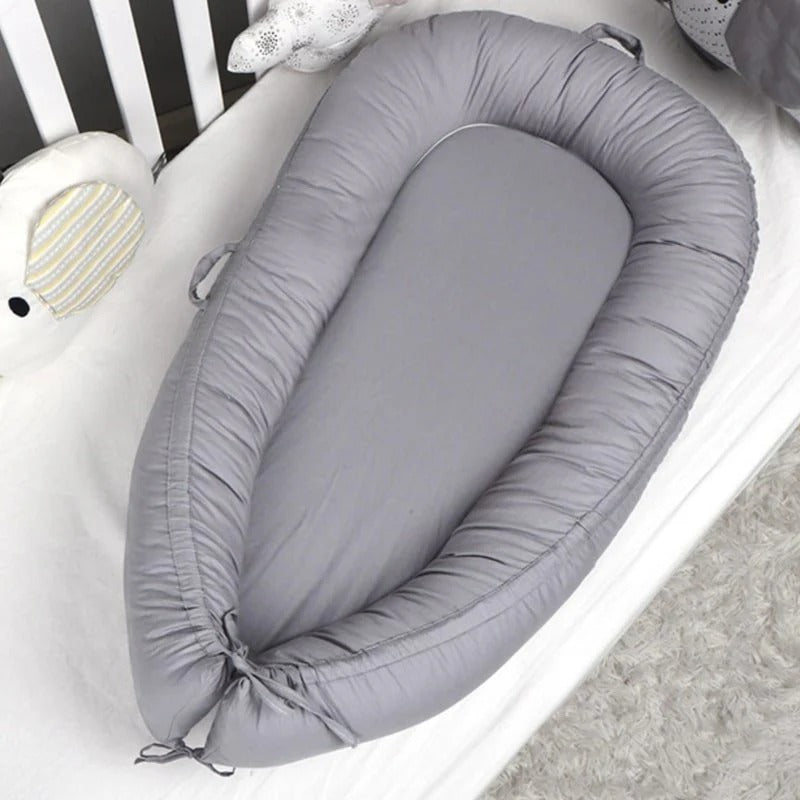 Réducteur de lit bébé – Confort