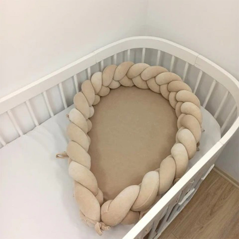 Réducteur de lit bébé tressés