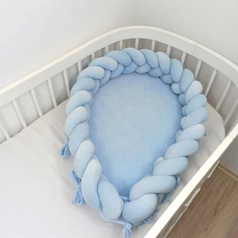 Réducteur de lit bébé tressés