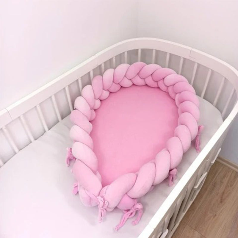 Réducteur de lit bébé tressés