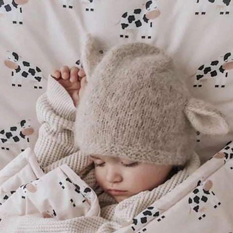 Réducteur de lit bébé – Vache