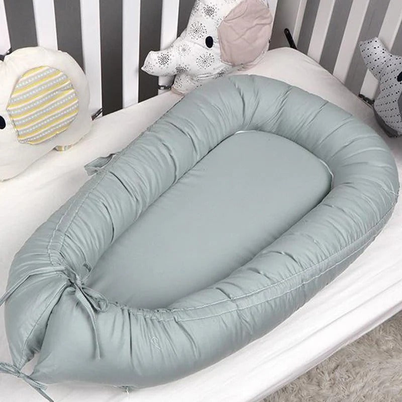 Réducteur de lit bébé – Confort