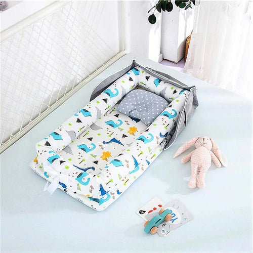 Matelas à langer portable dinosaure