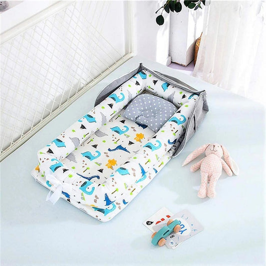 Matelas à langer portable dinosaure