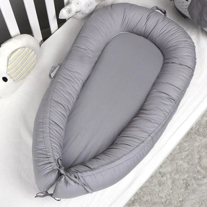 Réducteur de lit bébé – Confort