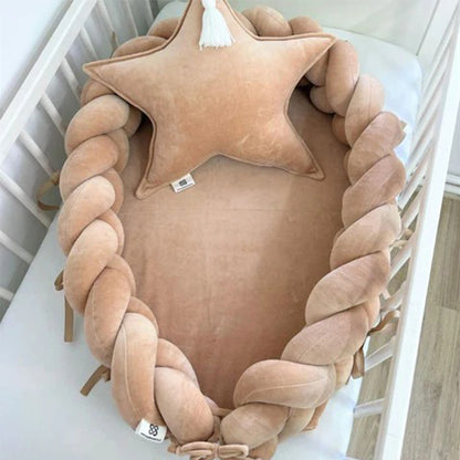 Réducteur de lit bébé tressés