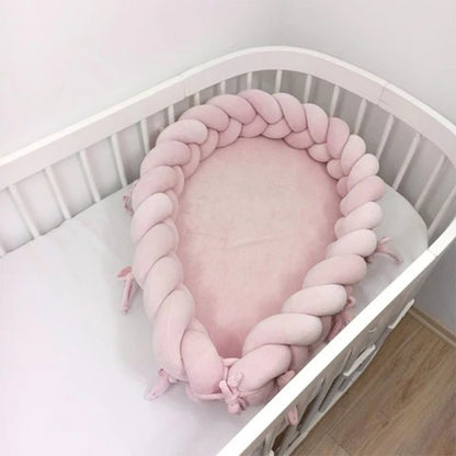 Réducteur de lit bébé tressés